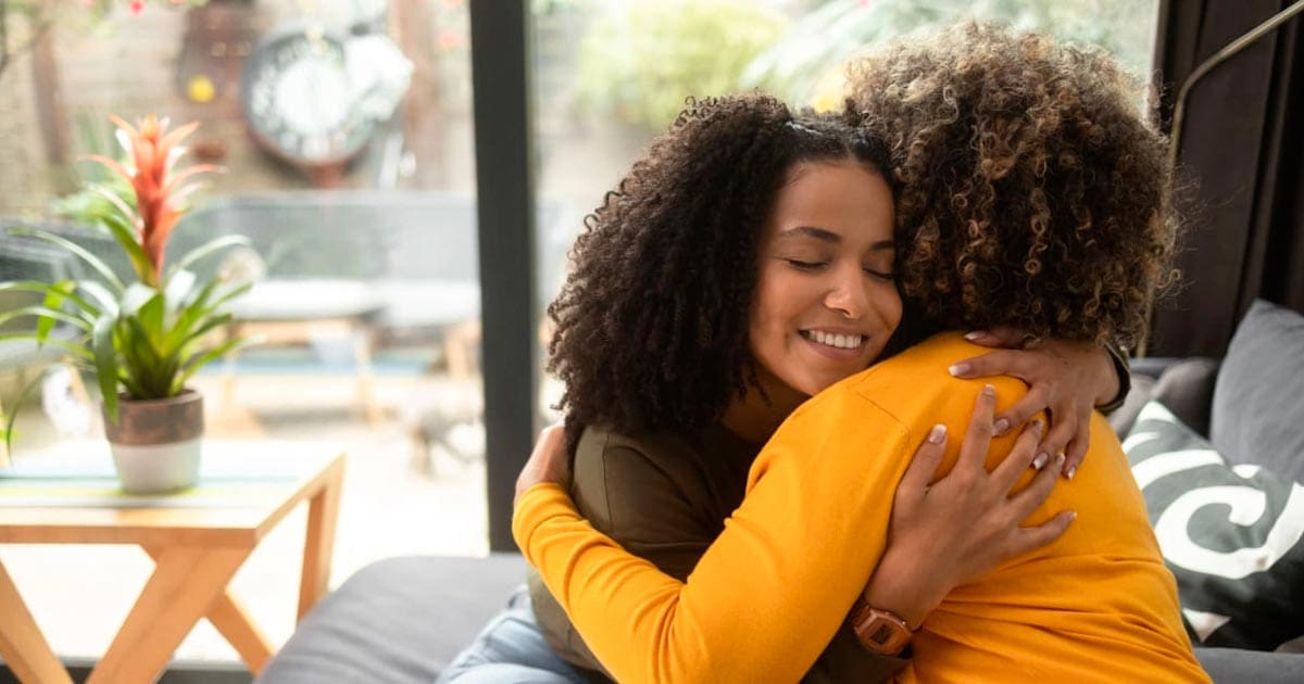 two women hugging