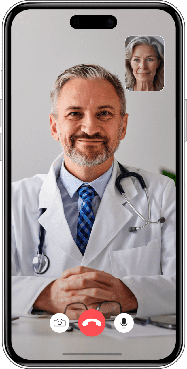 Smartphone mockup of a telehealth call between a male doctor on the main screen and a patient, whose face appears in the upper right corner of the screen